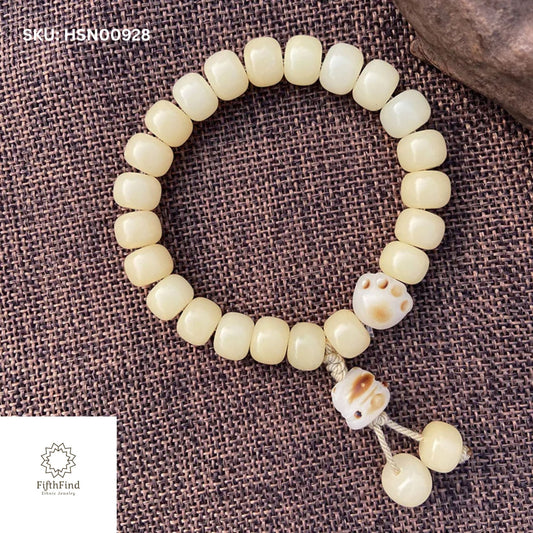 Cream Beaded Bracelet with Paw Charm for Boho Pet Lovers