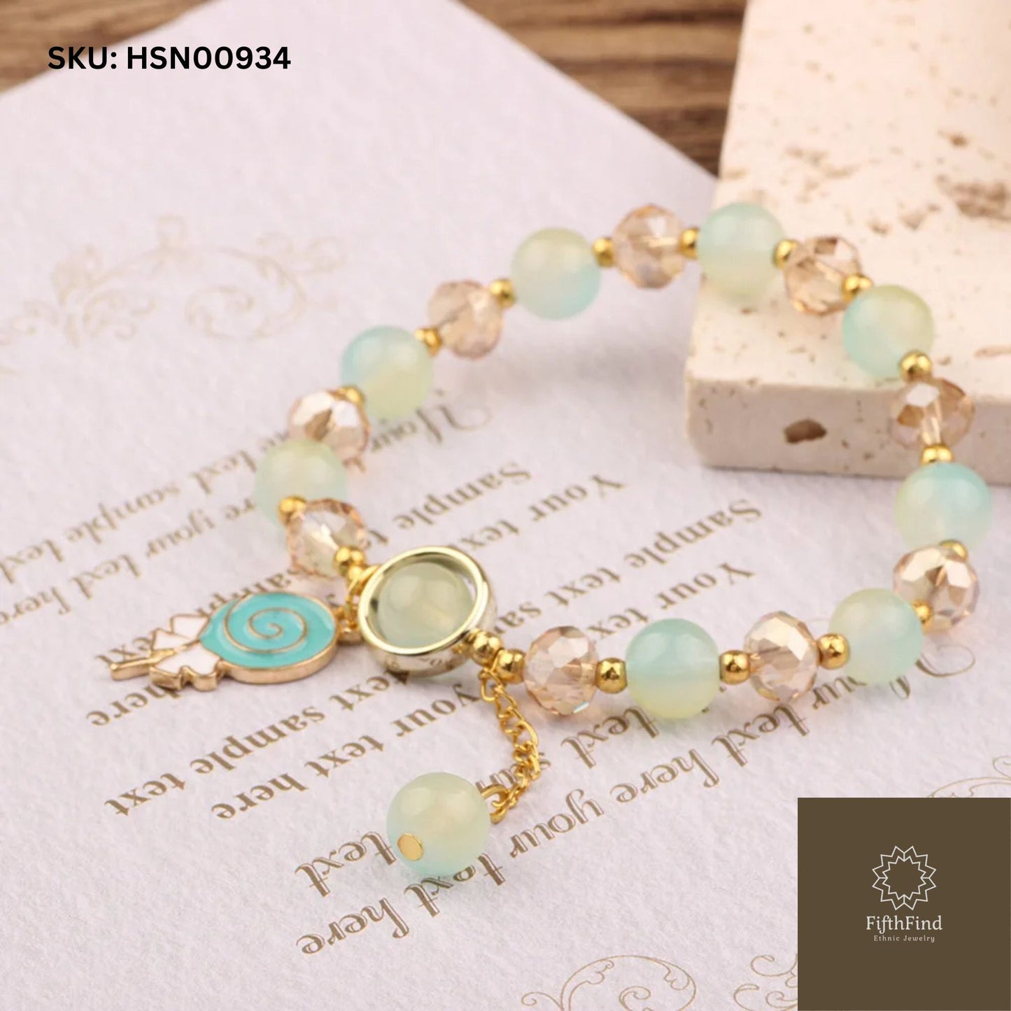 Elegant Aqua and Gold Charm Bracelet