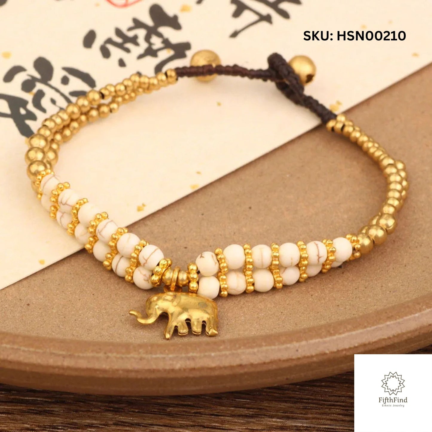 White Beaded Bracelet with Gold Elephant Charm