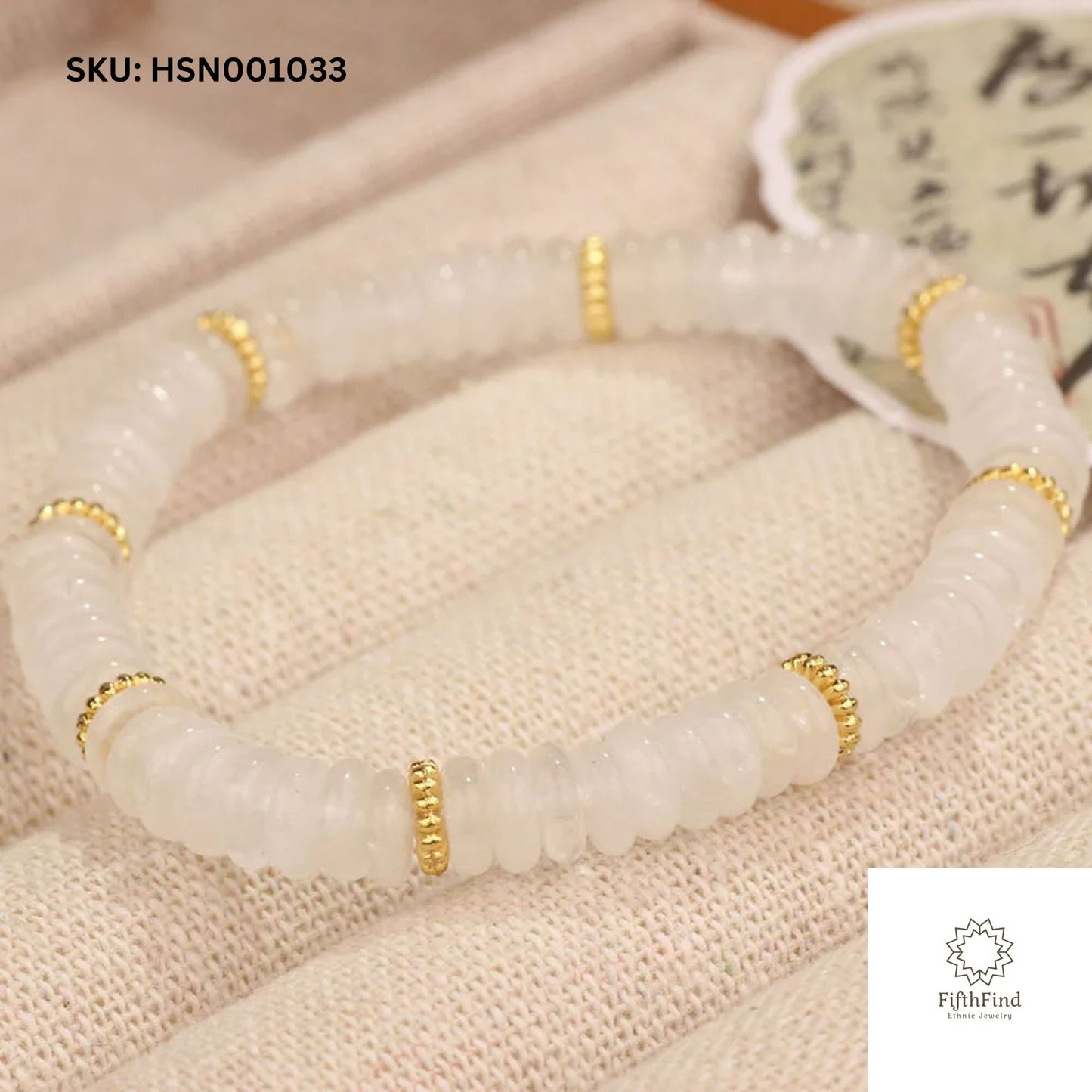 Elegant White Gemstone Bracelet with Gold Accents