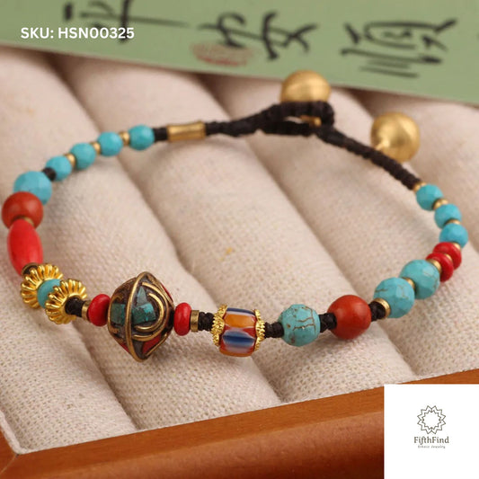 Turquoise and Red Beaded Bracelet with Tibetan Charm